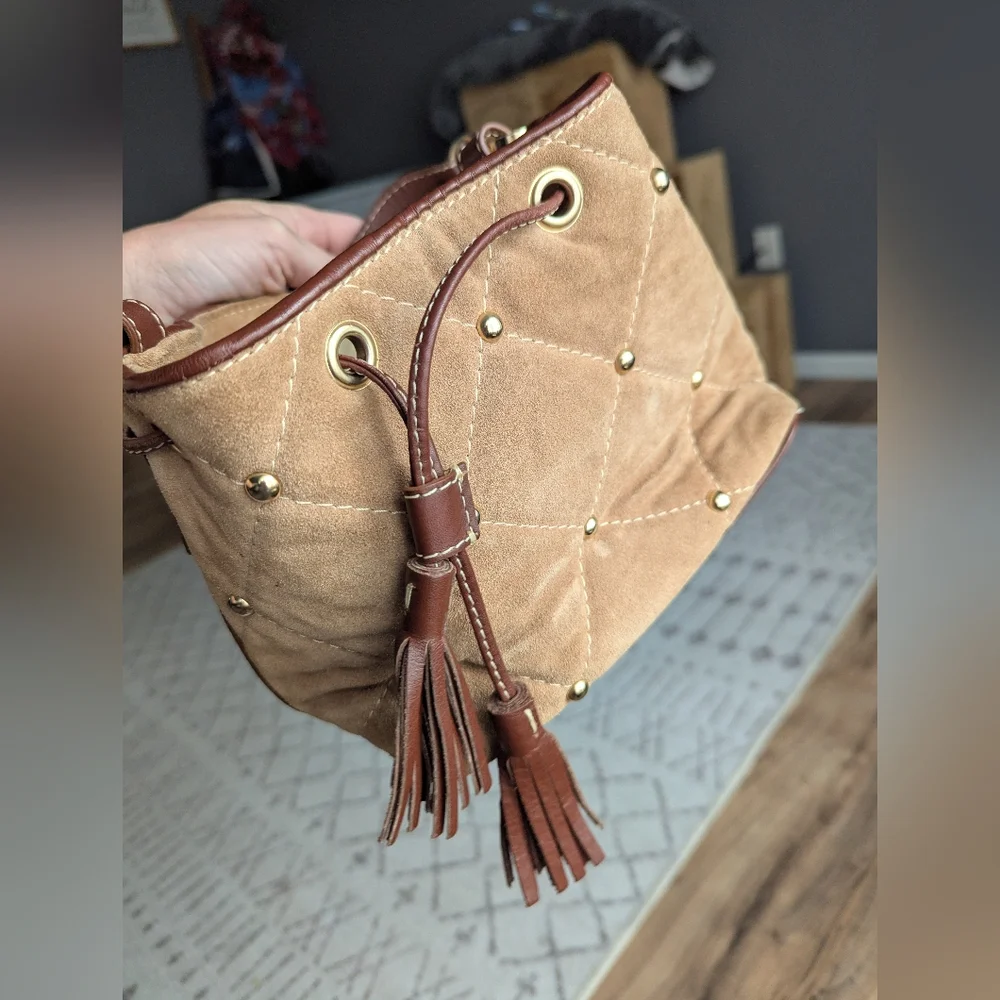 Claudia Firenze Leather Bucket Bag With Pull Top And Tassels.